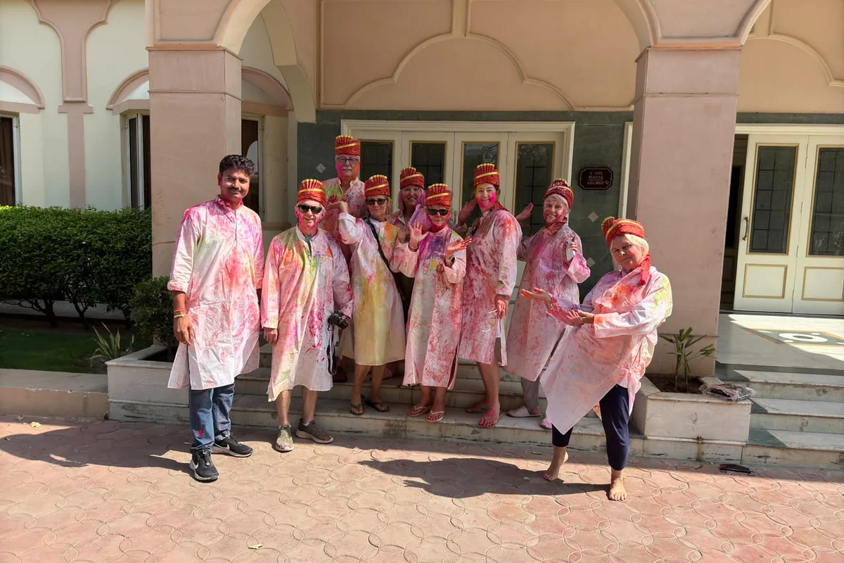 Guests wearing colourful traditional clothing during a Jaipur visit